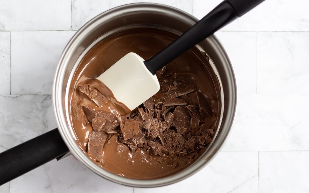 Add the rest of the chocolate How To Temper Chocolate.tasteofhome.nancy Mock 3