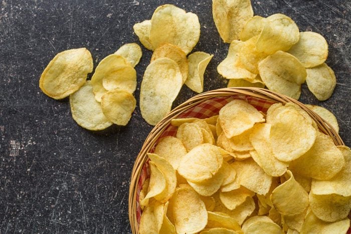 Potato chips in an over-filled bowl