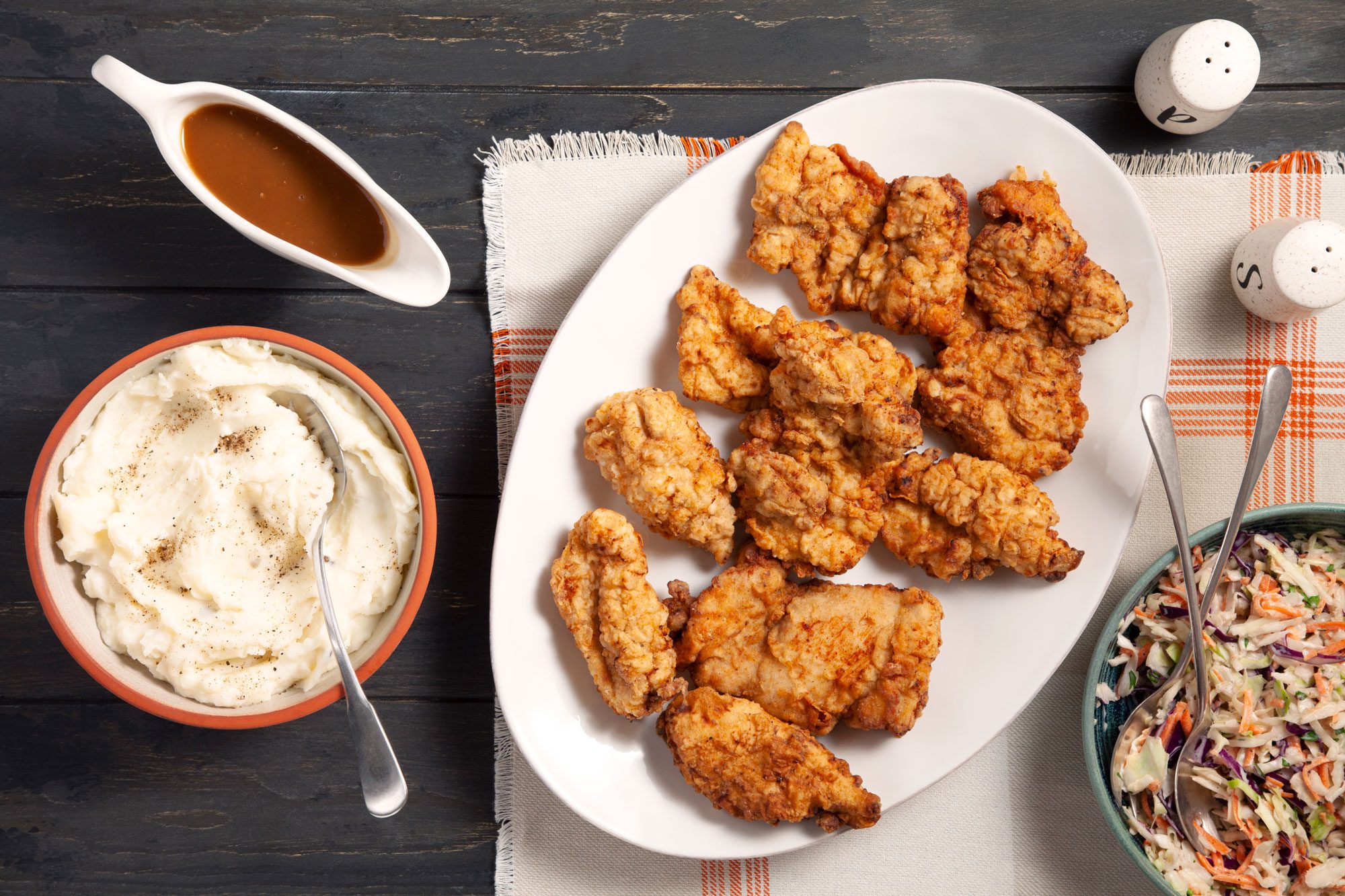 Cajun Country Fried Chicken served in plate with sauce