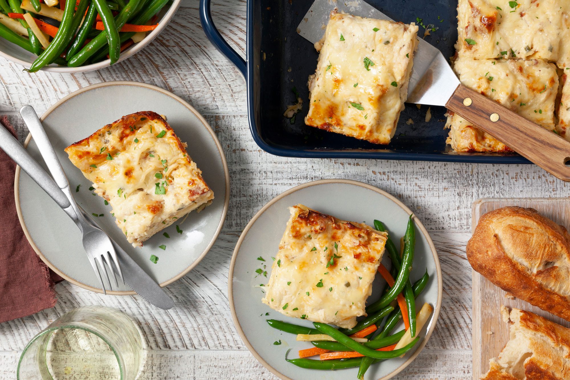 Chicken Alfredo Lasagna sliced and served