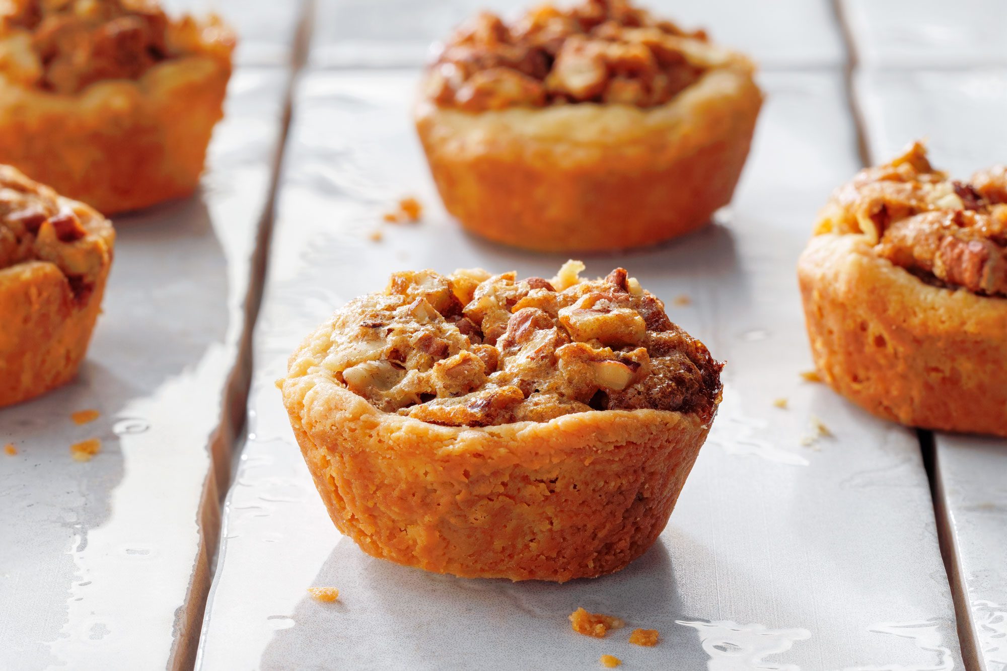 Pecan Tassies on Gloss Laminated Surface