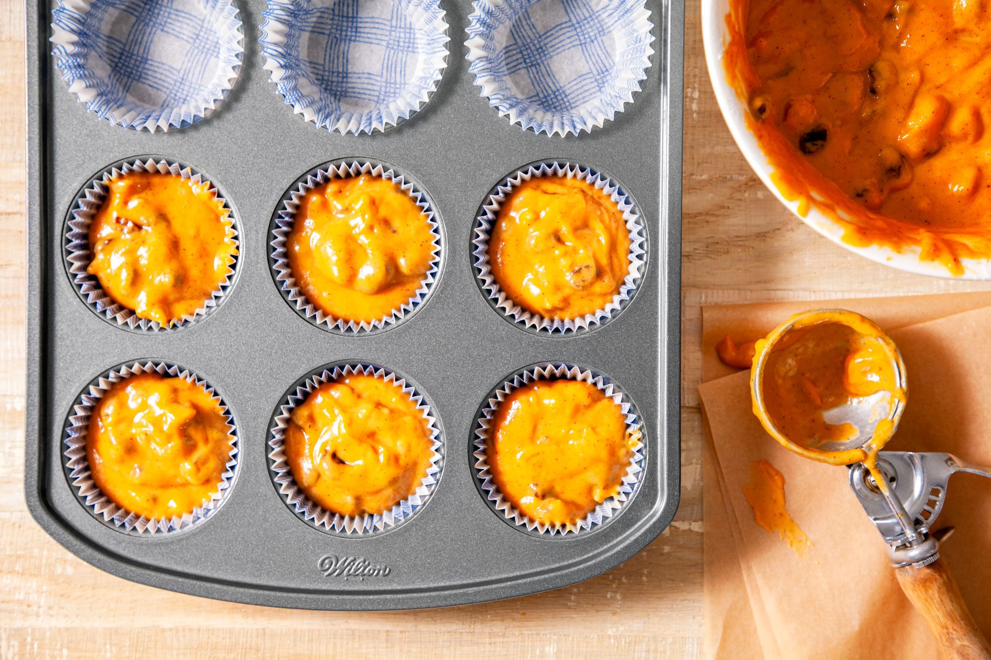 Preparing Pumpkin Streusel Muffins to Bake