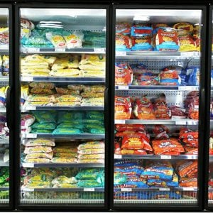  Frozen foods on shelves in a supermarket. In North America, consumption of frozen food has increased in recent years, mostly due to people