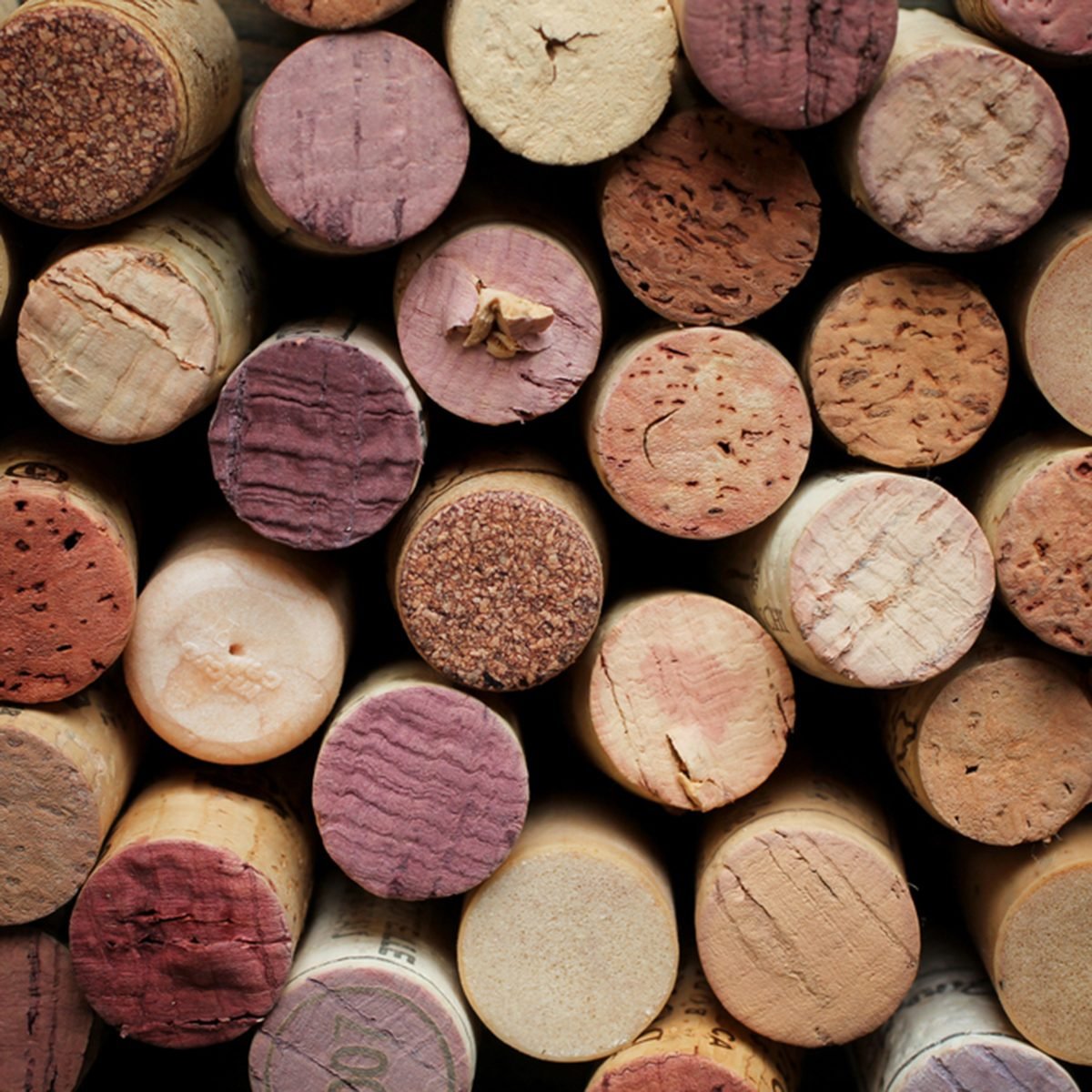 Close up of a cork wine with different variation of wine color