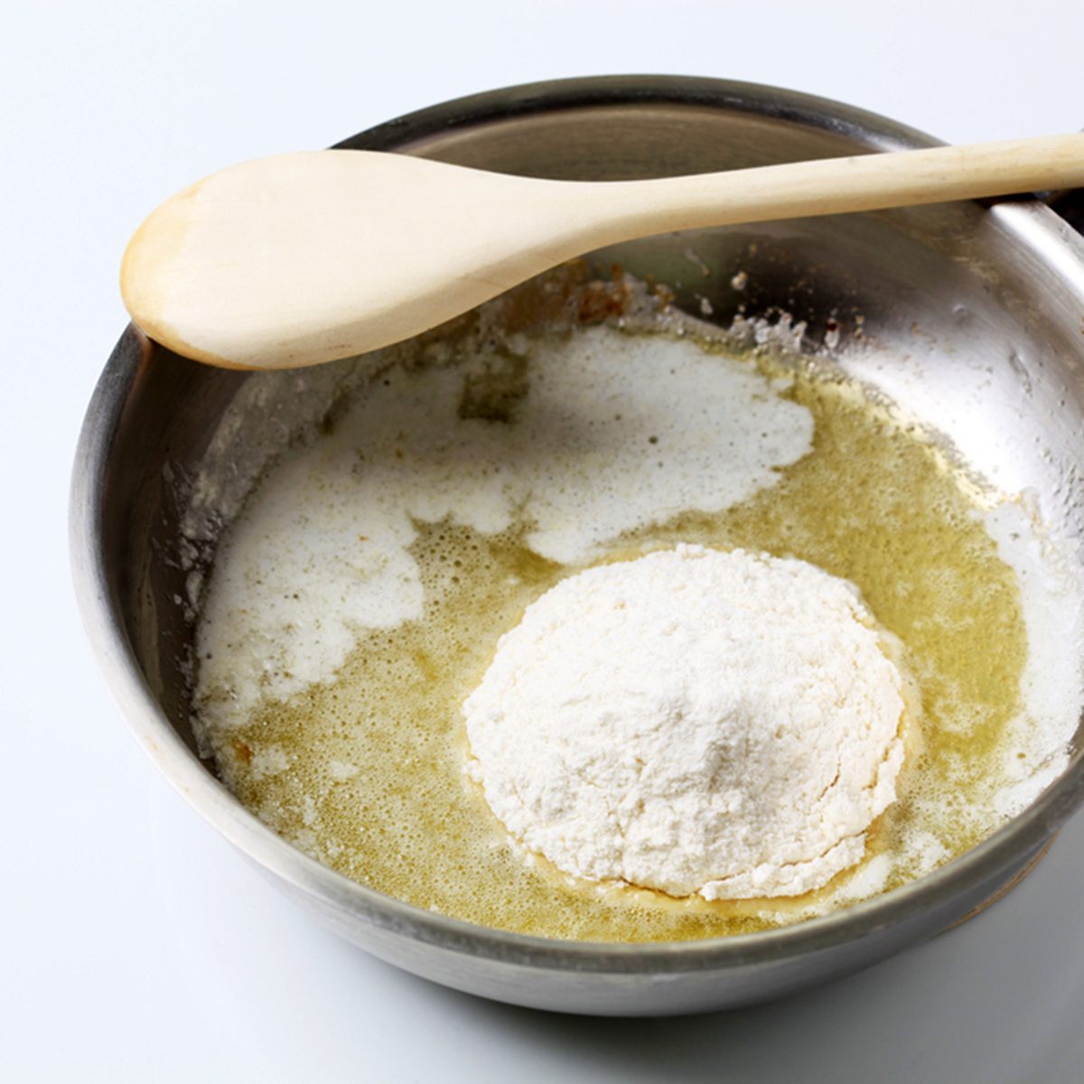 Preparing bechamel; Shutterstock ID 48788257; Job (TFH, TOH, RD, BNB, CWM, CM): TOH