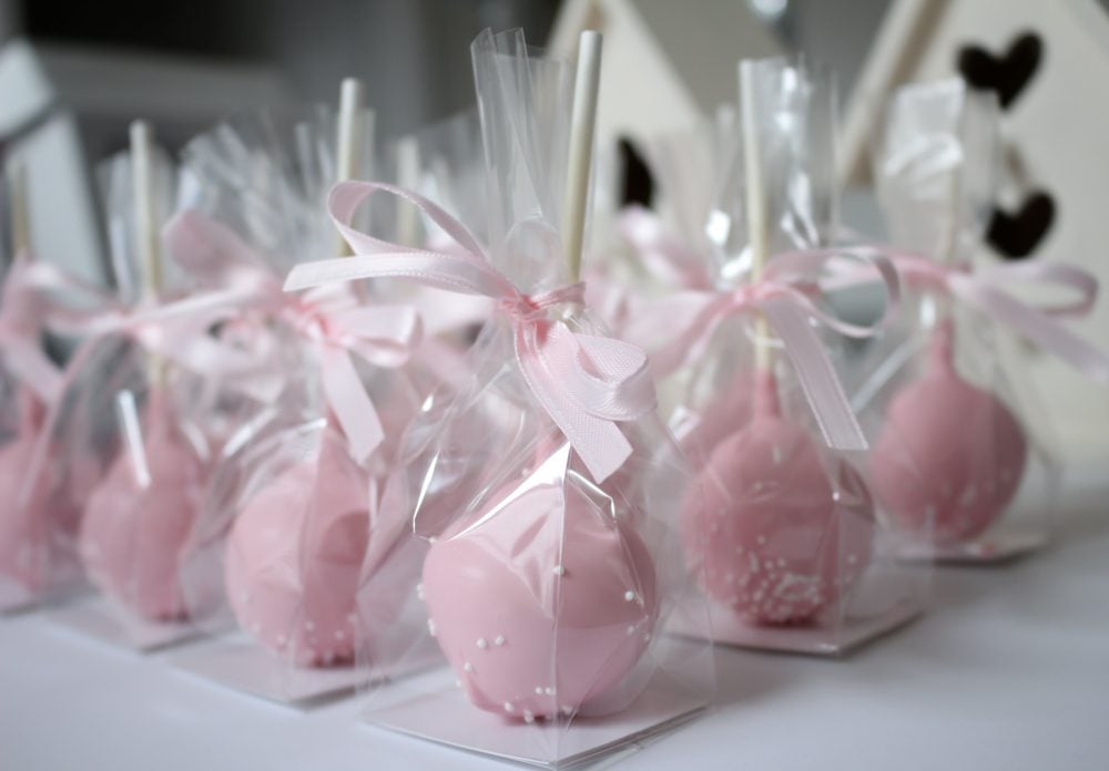 Pink cake pops wrapped;