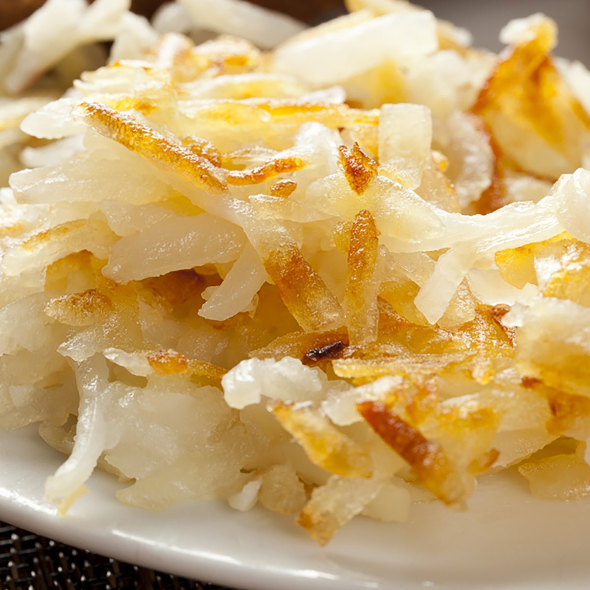 Homemade Wholesome American Breakfast with eggs, toast, and hashbrowns