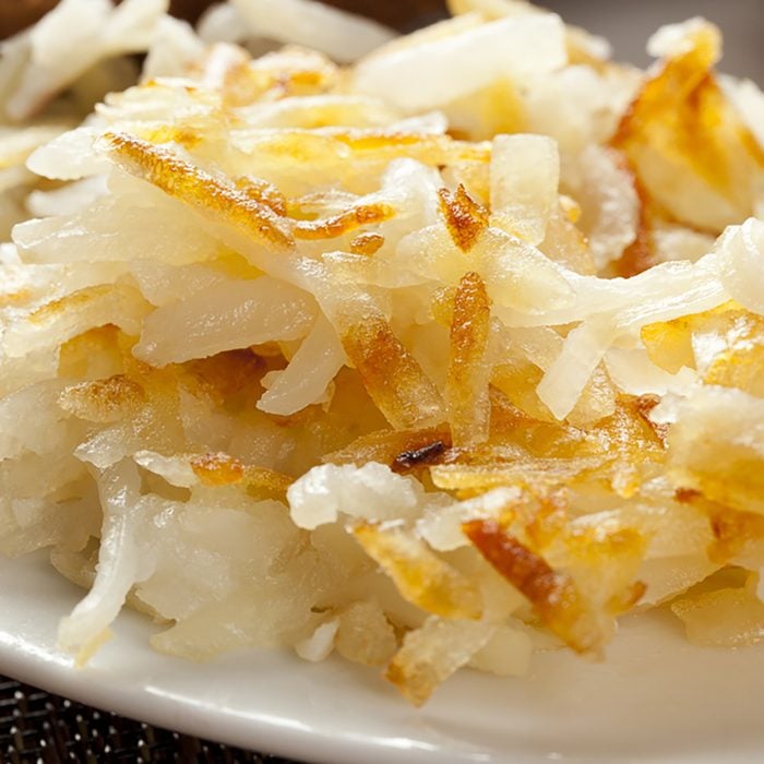 Homemade Wholesome American Breakfast with eggs, toast, and hashbrowns