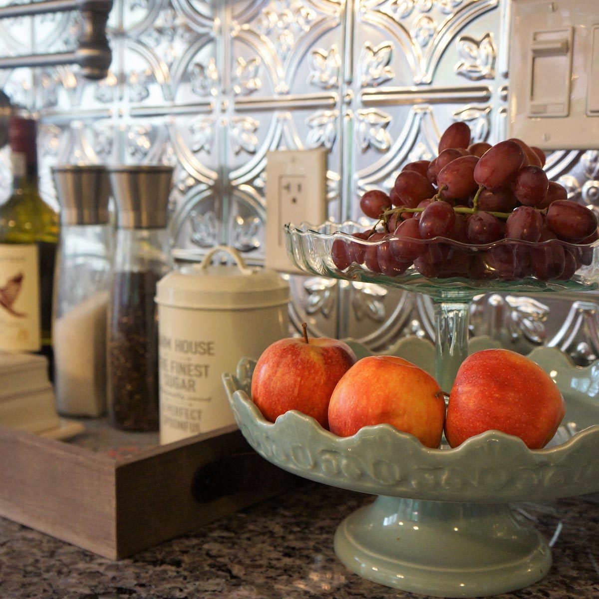 Kitchen with a pressed tin backsplash