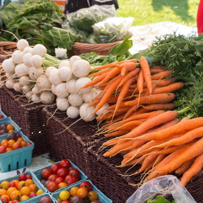 organic produce on sale at outdoor farmers market