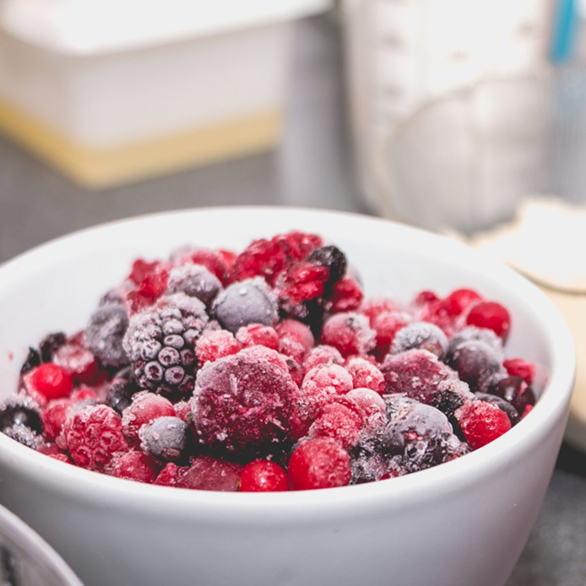 Closeup of frozen red berries on a kitchen counter in France