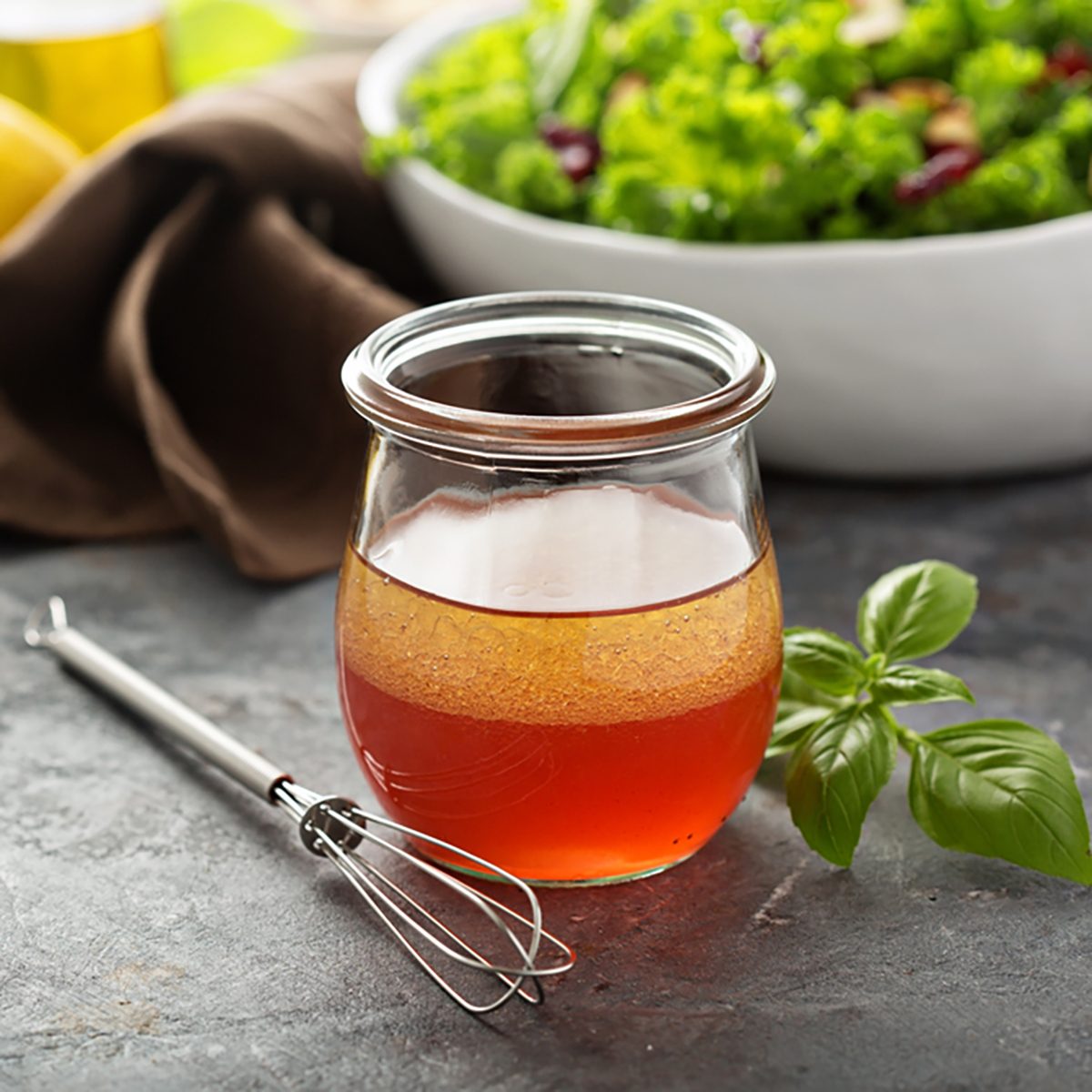 Homemade salad dressing vinaigrette with raspberry and pomegranate juice