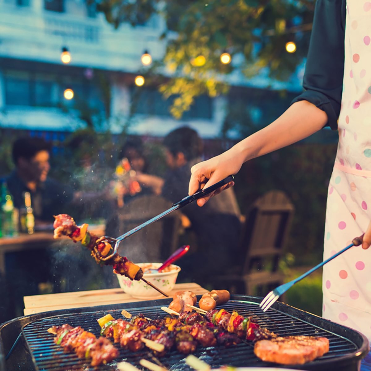 Asian woman are cooking for a group of friends to eat barbecue;
