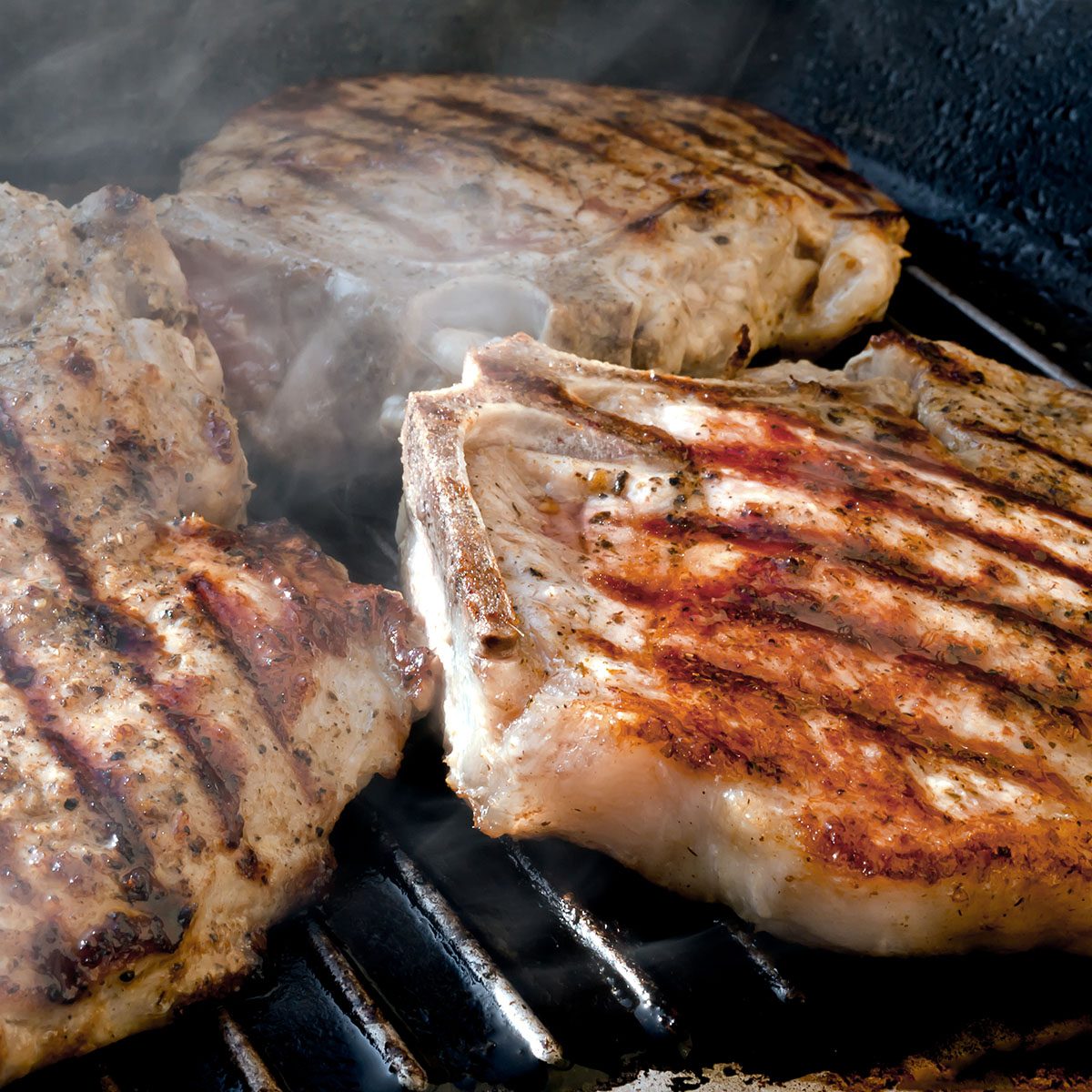 Pork chop grilled with delicious toasted traces and fragrant smoke; Shutterstock ID 100378781; Job (TFH, TOH, RD, BNB, CWM, CM): Taste of Home