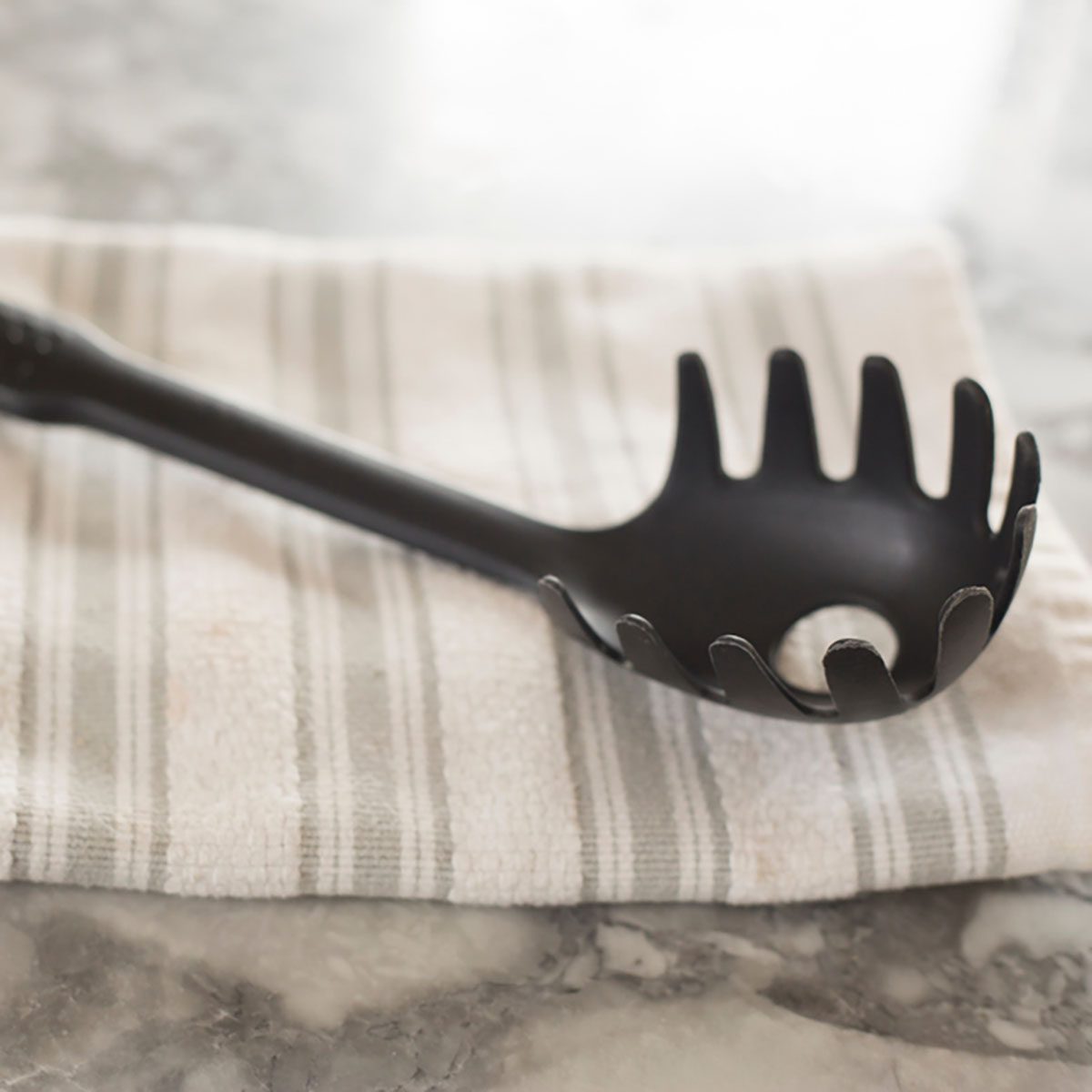 Black plastic kitchen cooking utensils with selective focus; Shutterstock ID 1081367651; Job (TFH, TOH, RD, BNB, CWM, CM): Taste of Home