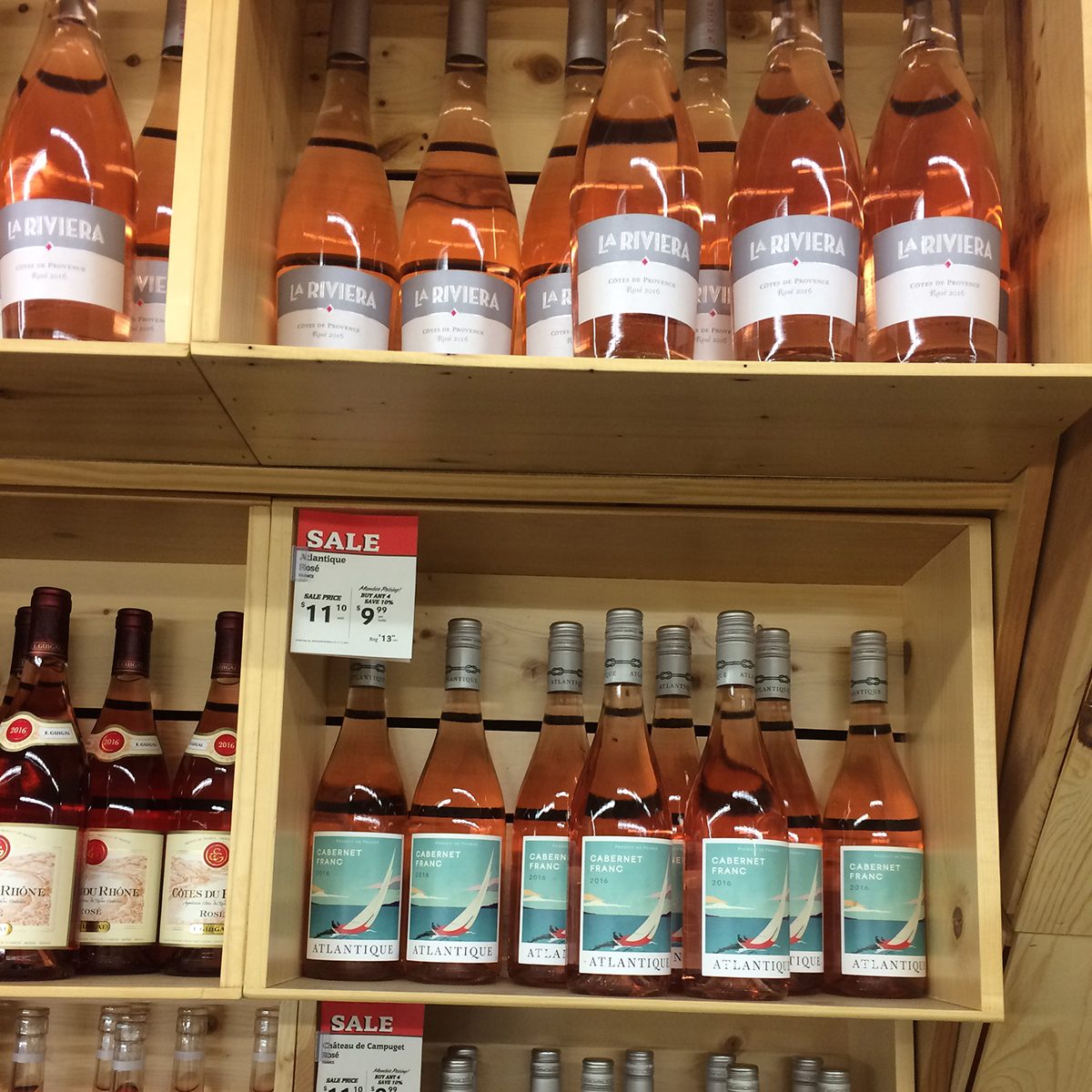Various bottles of wine in crates