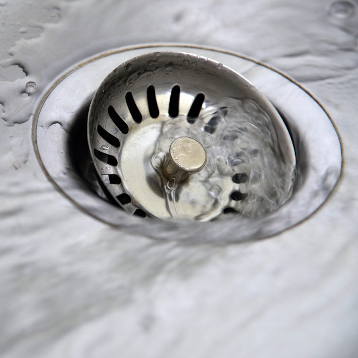 water draining in washbasin