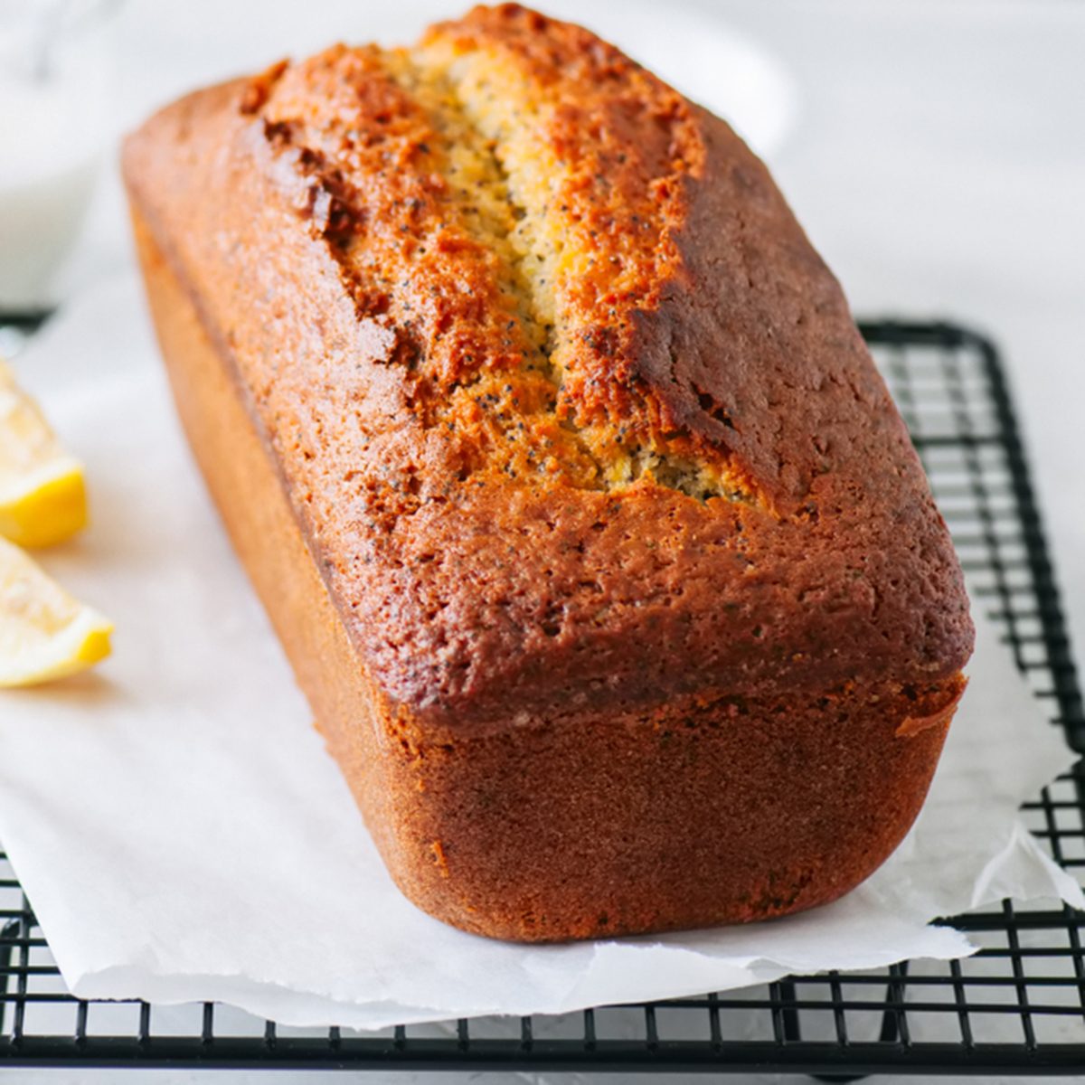 Homemade lemon poppy seed pound cake on a wire rack.