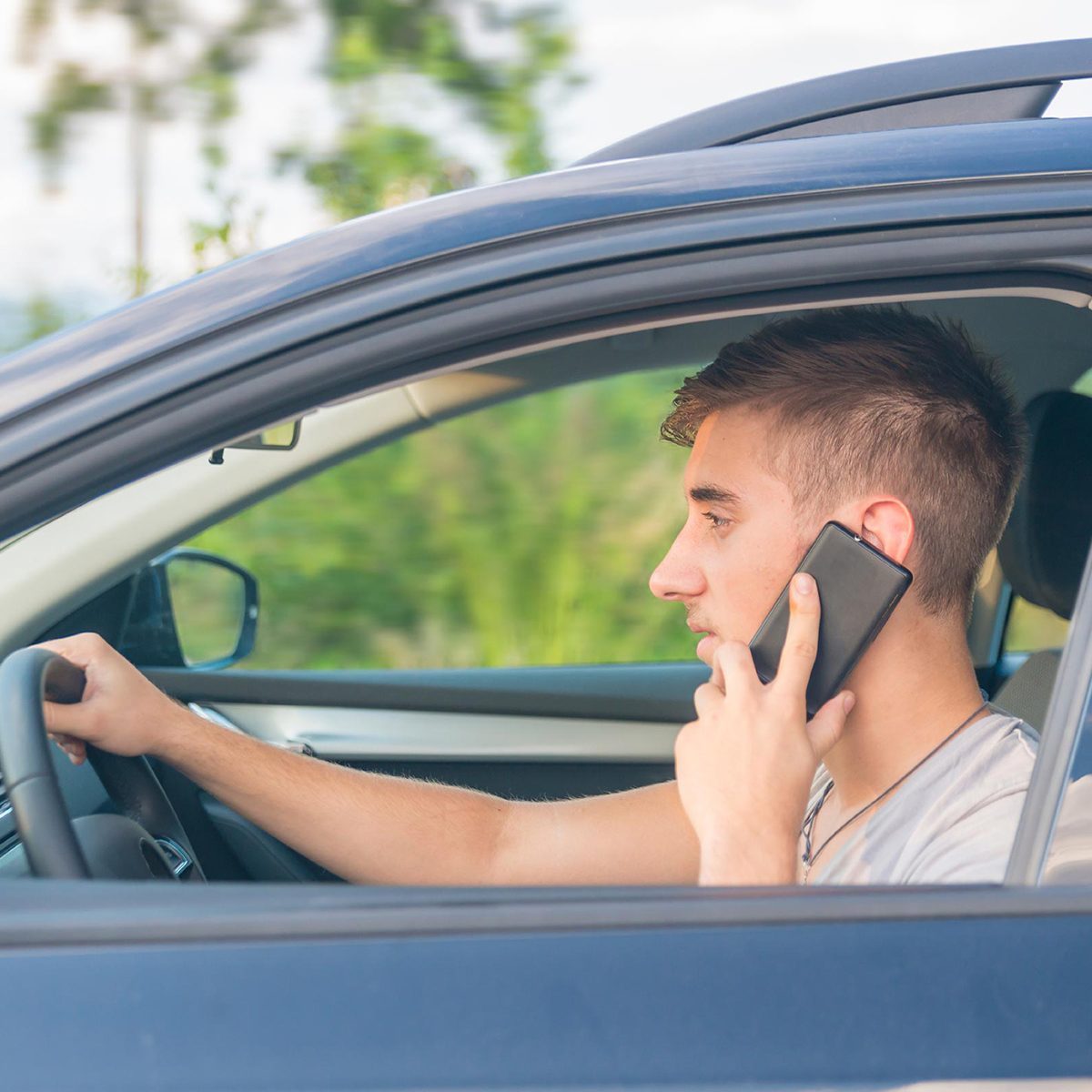 Driver Talks on Cell Phone