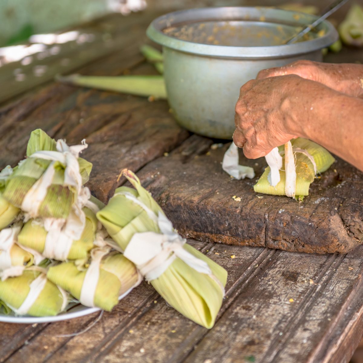 Preparing tamales during the day.