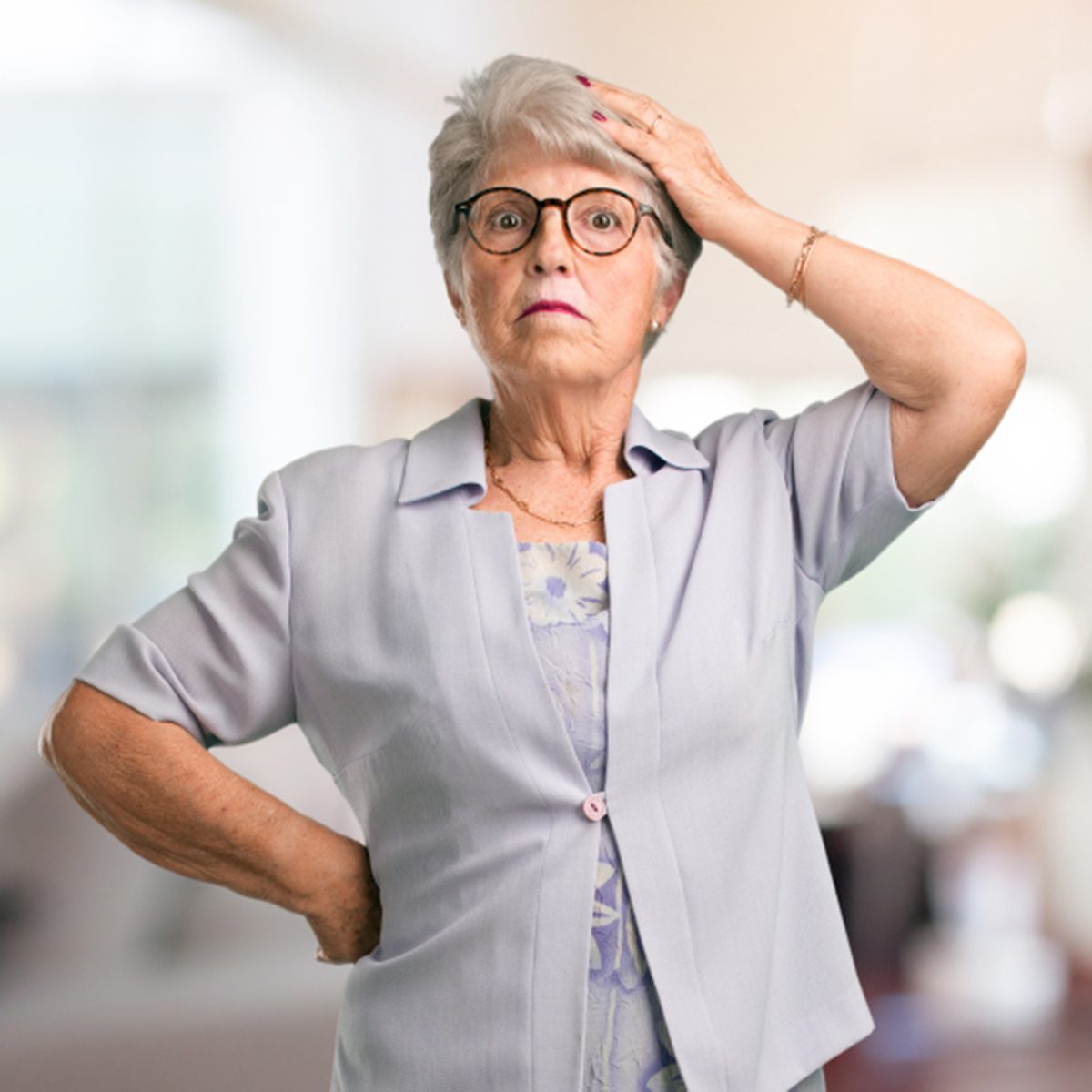 Beautiful senior woman worried and overwhelmed