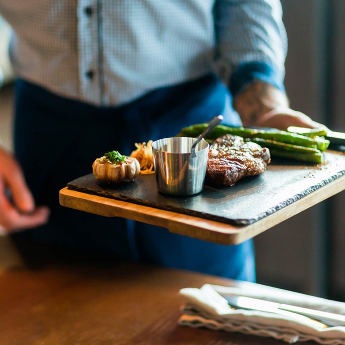 Waiter delivering food