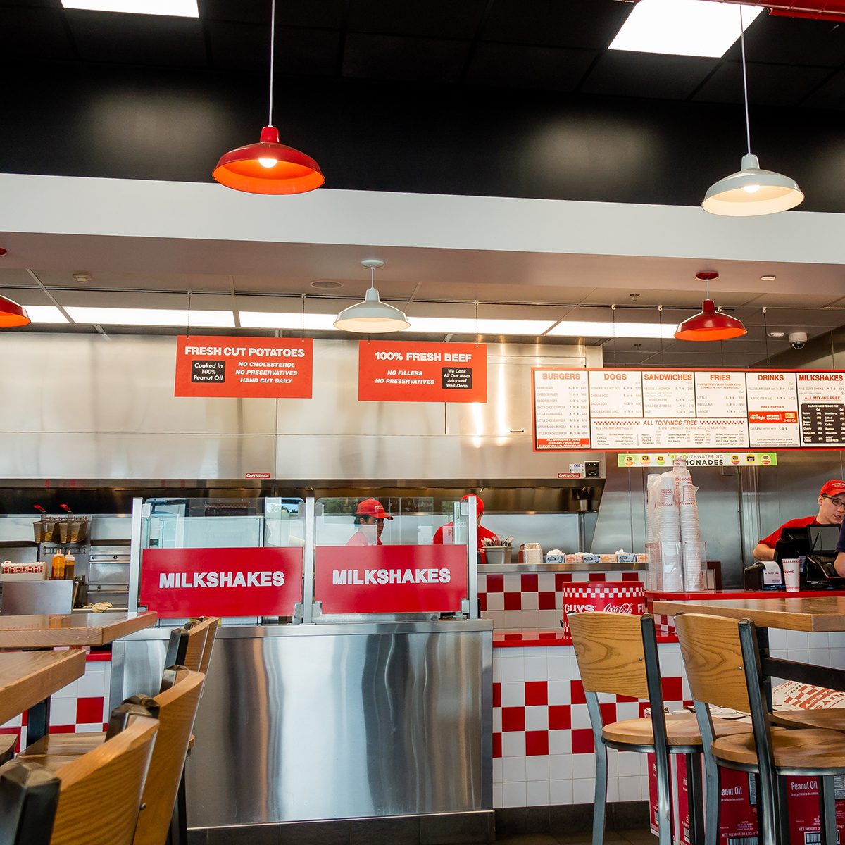 The interior of a Five Guys burger restaurant.