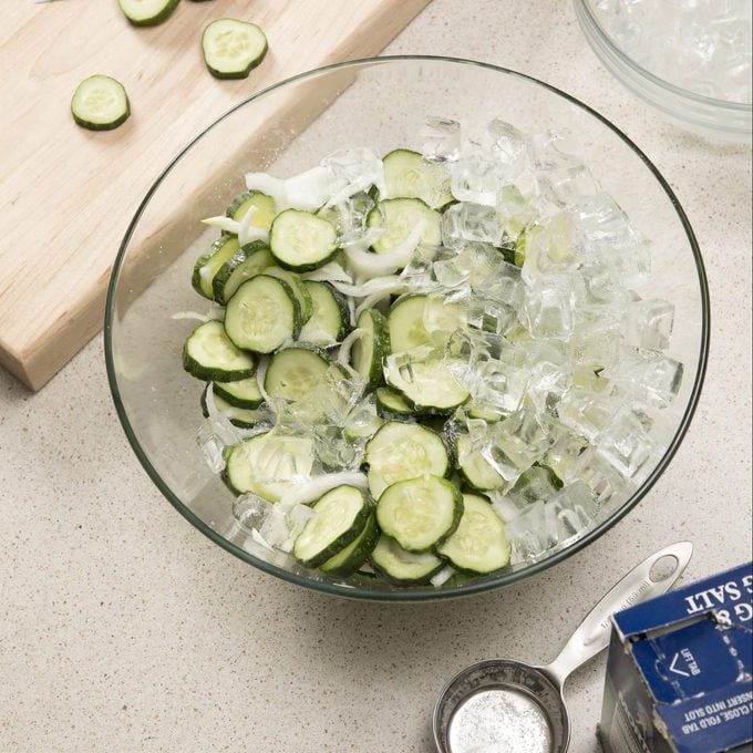Combine Ice Cucumbers Onion And Salt