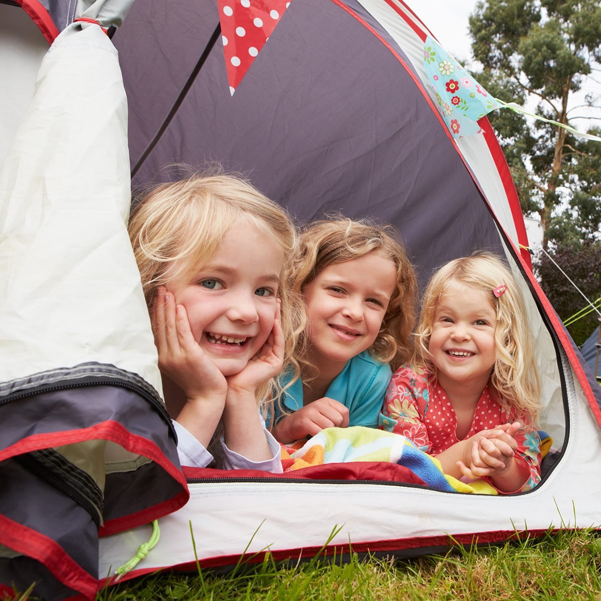 Family Enjoying Camping Holiday On Campsite
