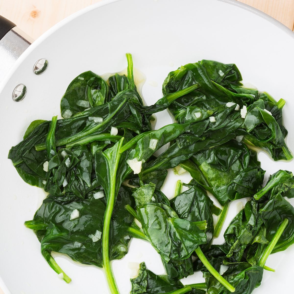 Fresh cooked spinach in a pan.