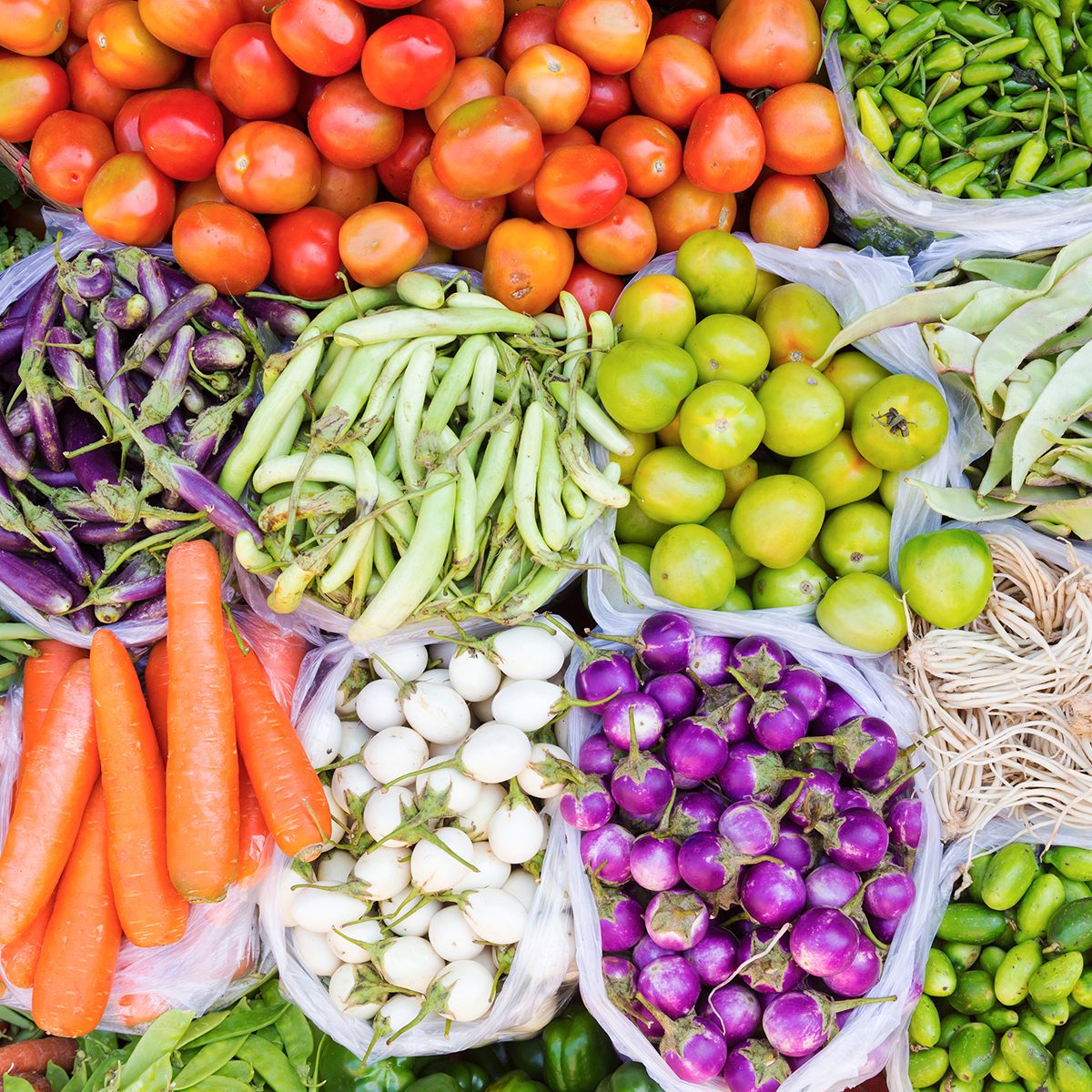 Farmers market with various domestic colorful fresh fruits and vegetable.