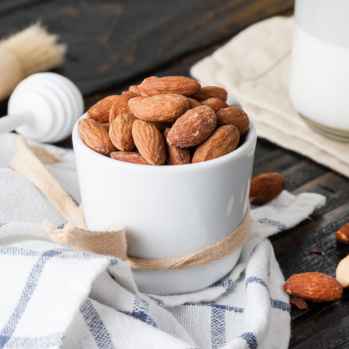 closeup heap of roasted salted almonds, peeled almonds