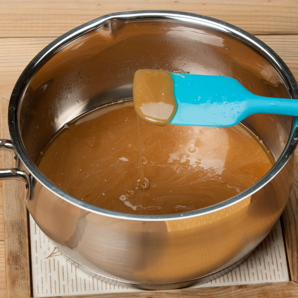 Caramel Cooking Process. Melted Toffee In Sauce Pan