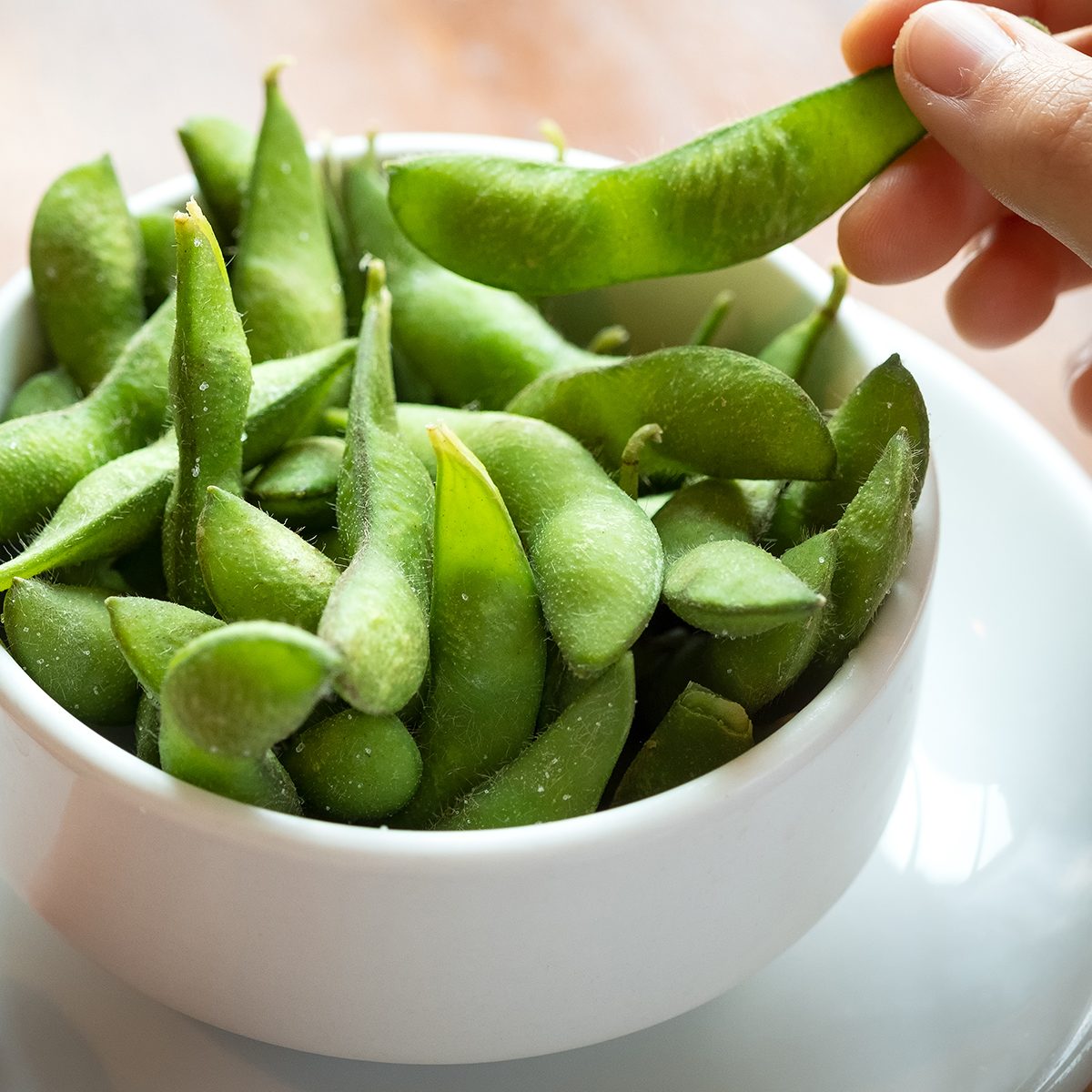 Personal perspective of a diner eating a Japanese meal.