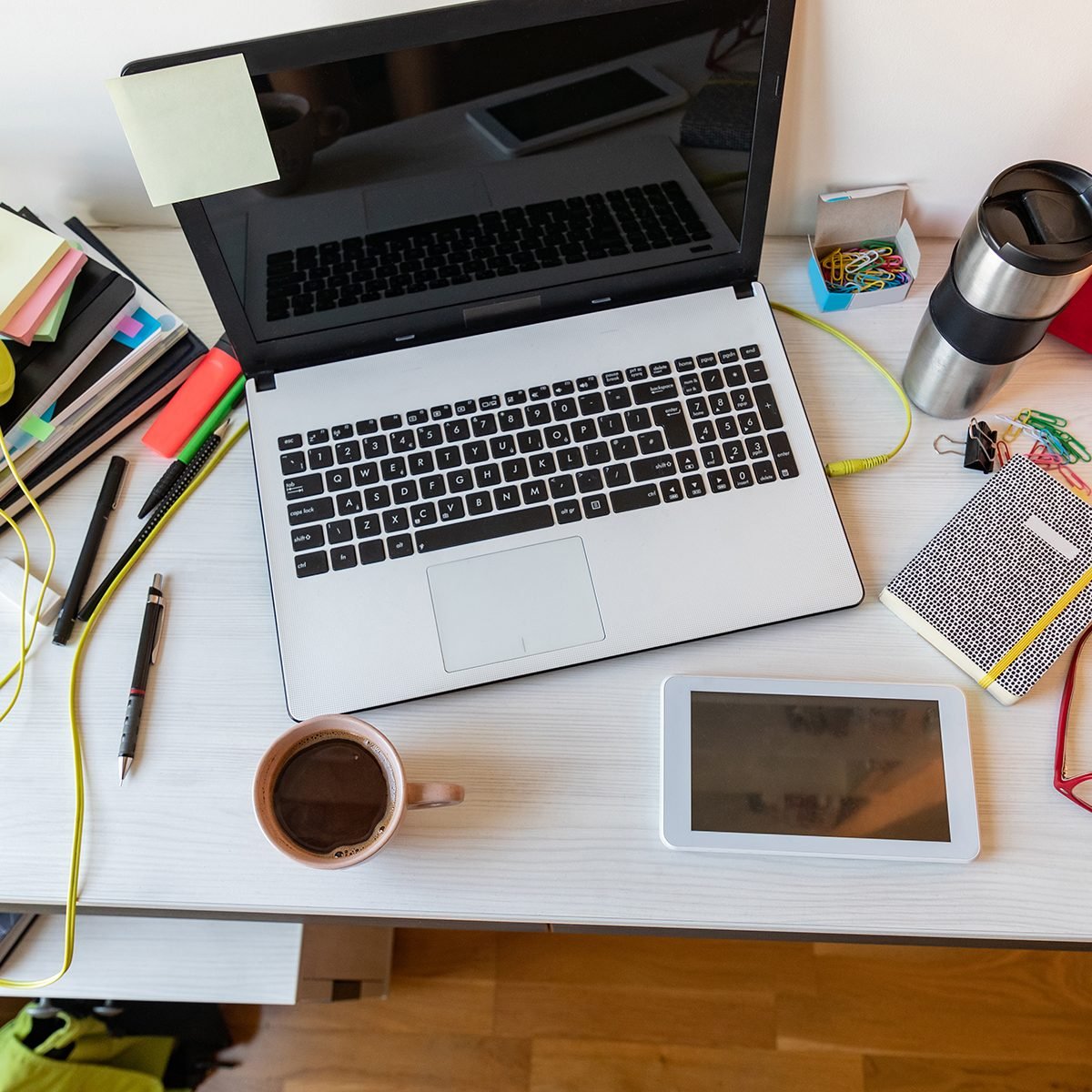 Directly above view of a messy desk at home office