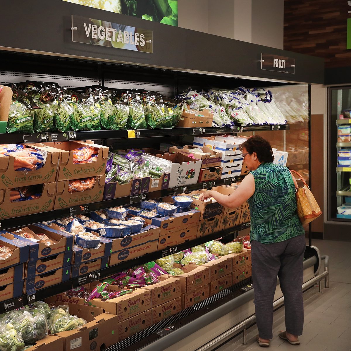 CHICAGO, IL - JUNE 12: Customers shop at an Aldi grocery store on June 12, 2017 in Chicago, Illinois. Aldi has announced plans to open 900 new stores in the United States in the next five years. The $3.4 billion capital investment would create 25,000 jobs and make the grocery chain the third largest in the nation behind Wal-Mart and Kroger. (Photo by Scott Olson/Getty Images)