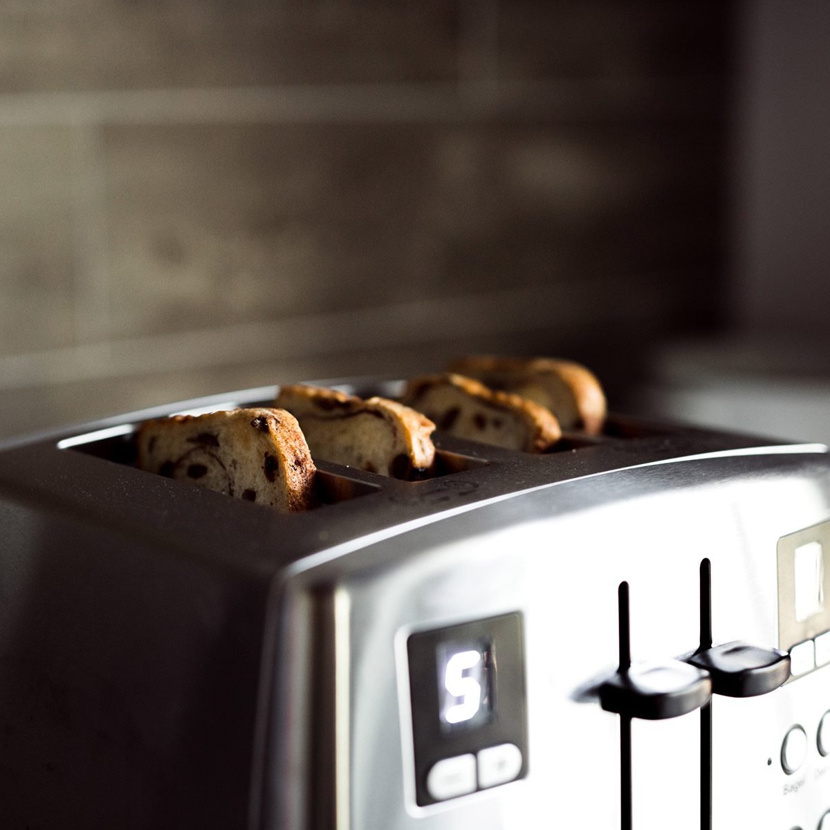 close up photo of a sliced bread in a toaster