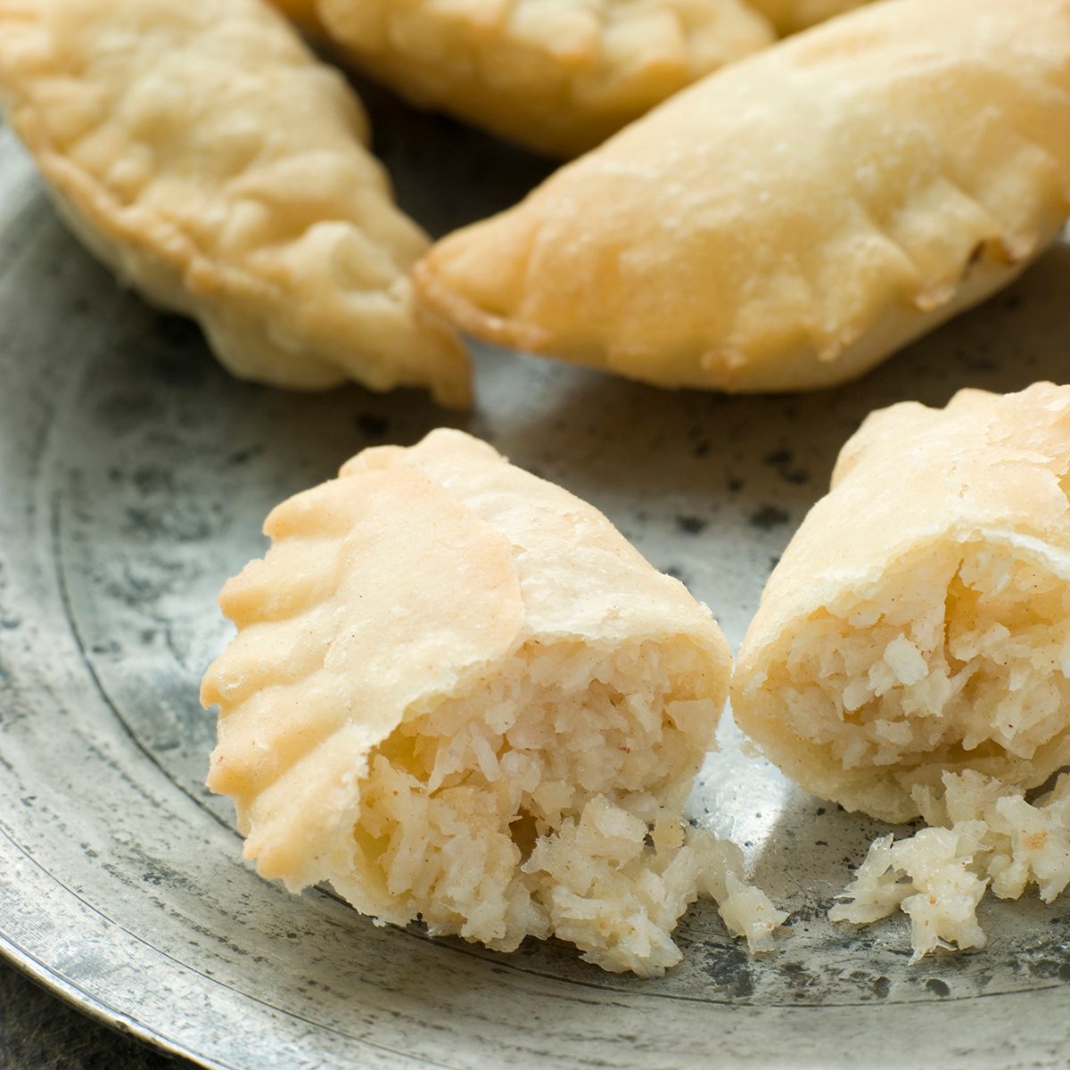 Pewter plate of Coconut Karanji