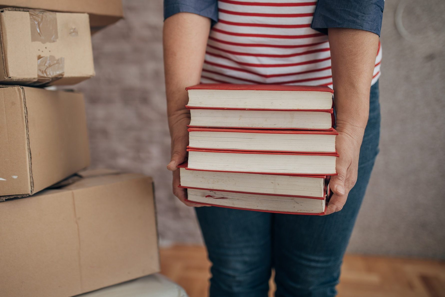 Old Textbooks being taken out of a basement