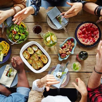 Family sitting down for a meal together