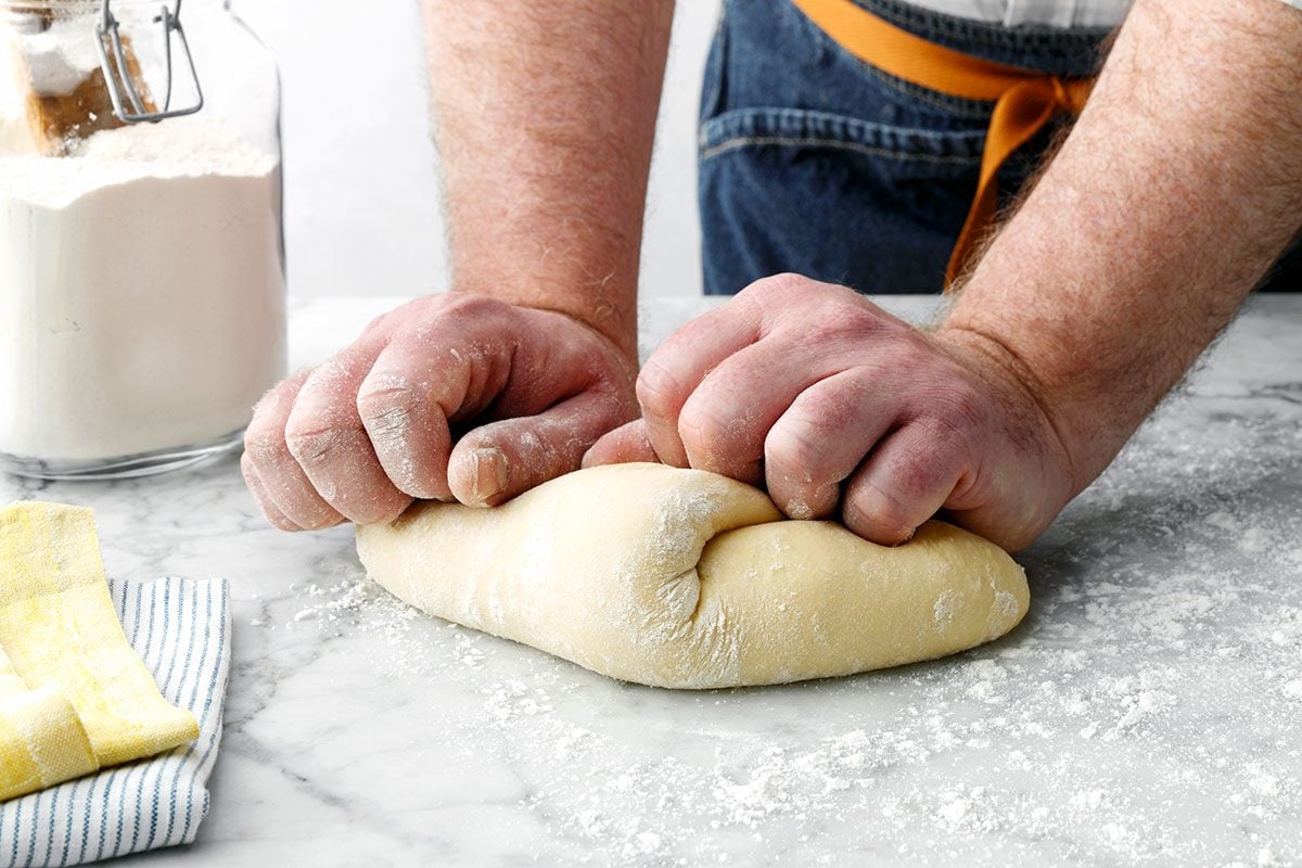 Paczki Dough Being Kneaded