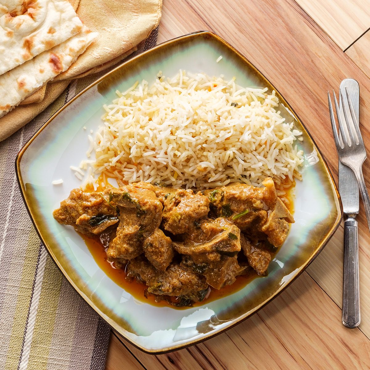 traditional jamaican foods Authentic Indian goat korma curry with jasmine rice