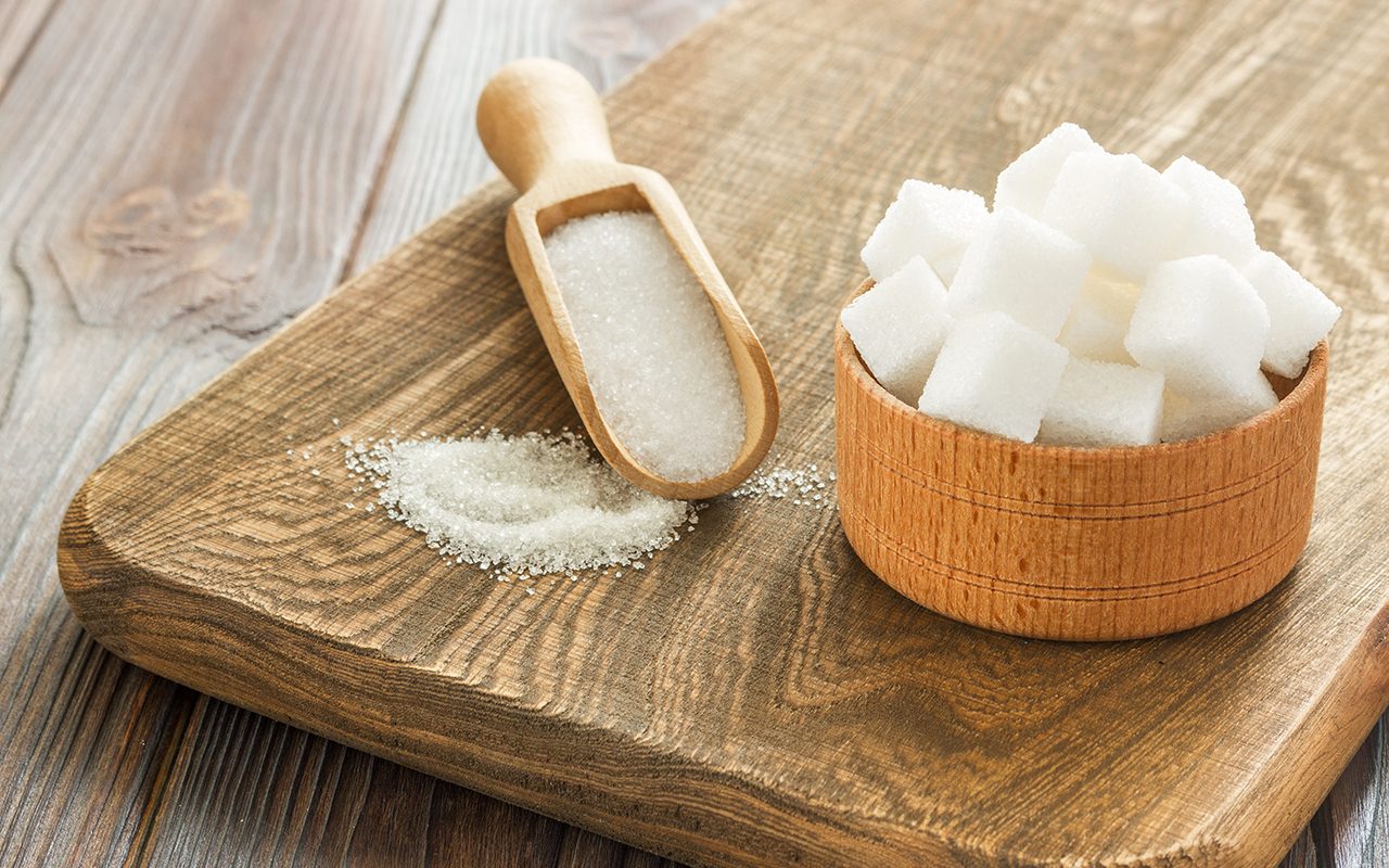 Baking substitutes Close Up Of Sugar In Spoon And Bowl On Cutting Board