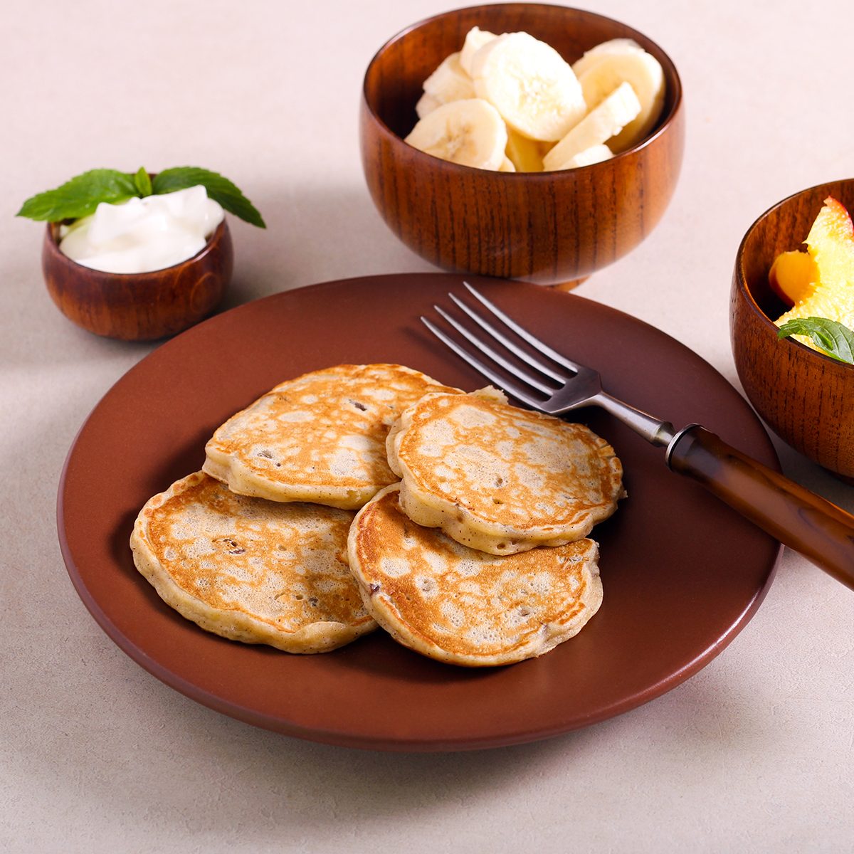 Banana And Sultana Pancakes With Fruit Topping