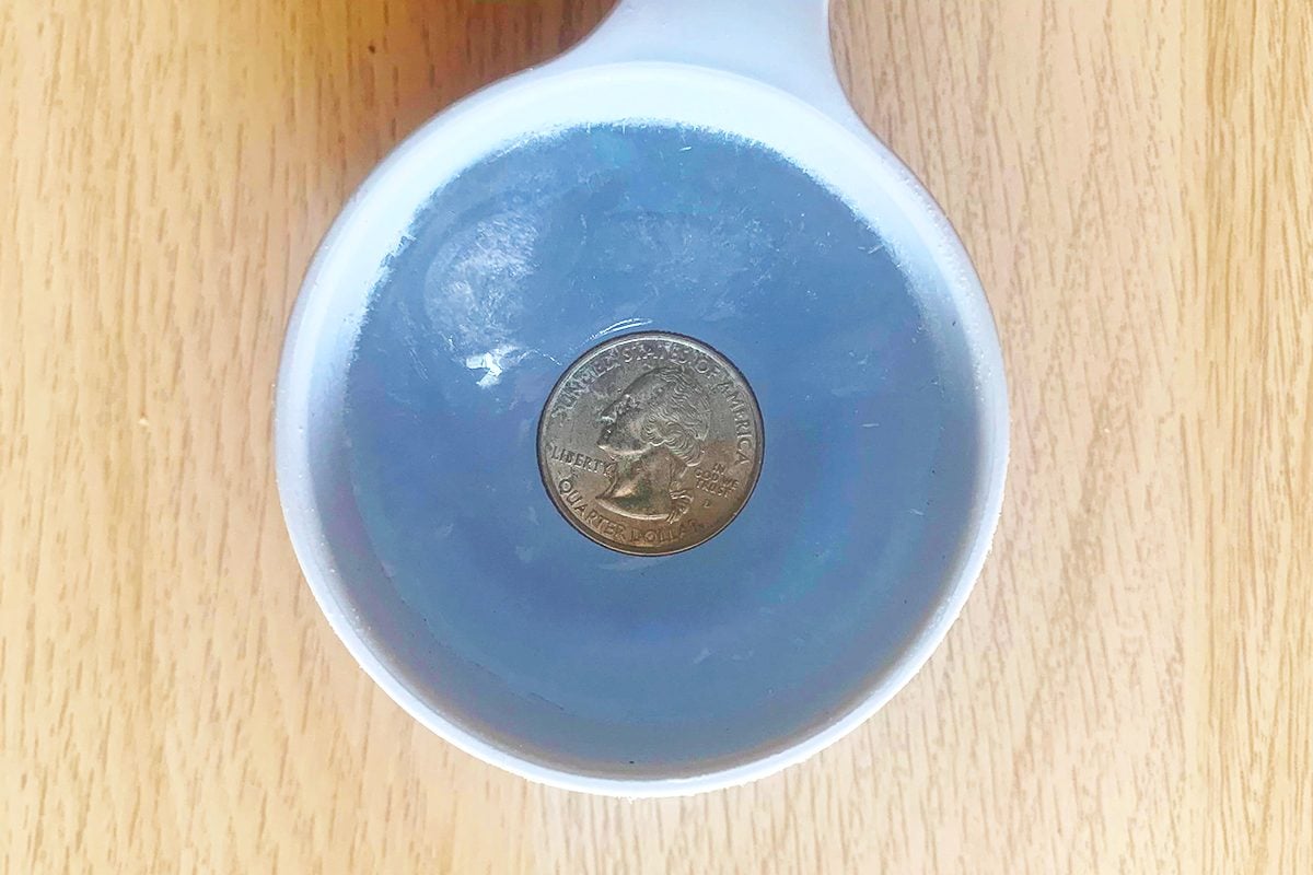 This Is Why People Leave a Quarter in a Cup of Frozen Water in the Freezer