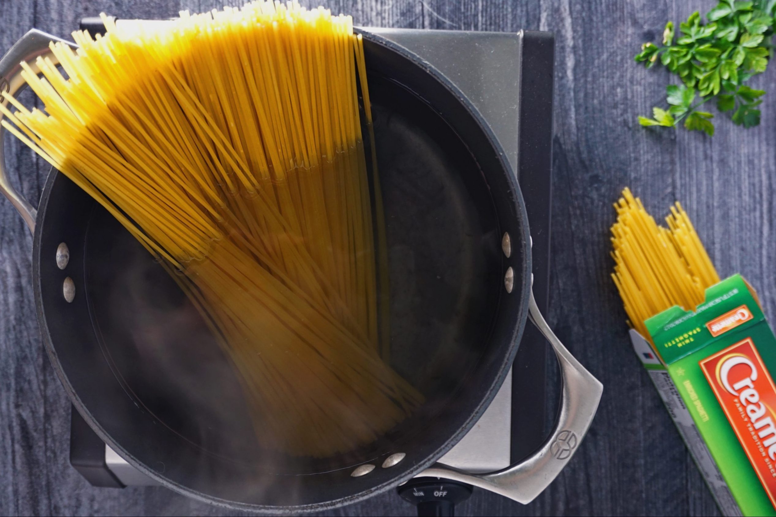 Cooking The Pasta For Chicken Bellagio