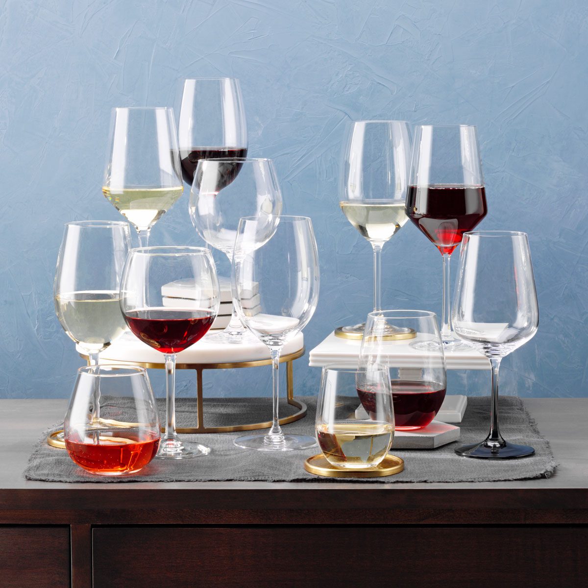 collection of different sizes and shapes of wine glasses