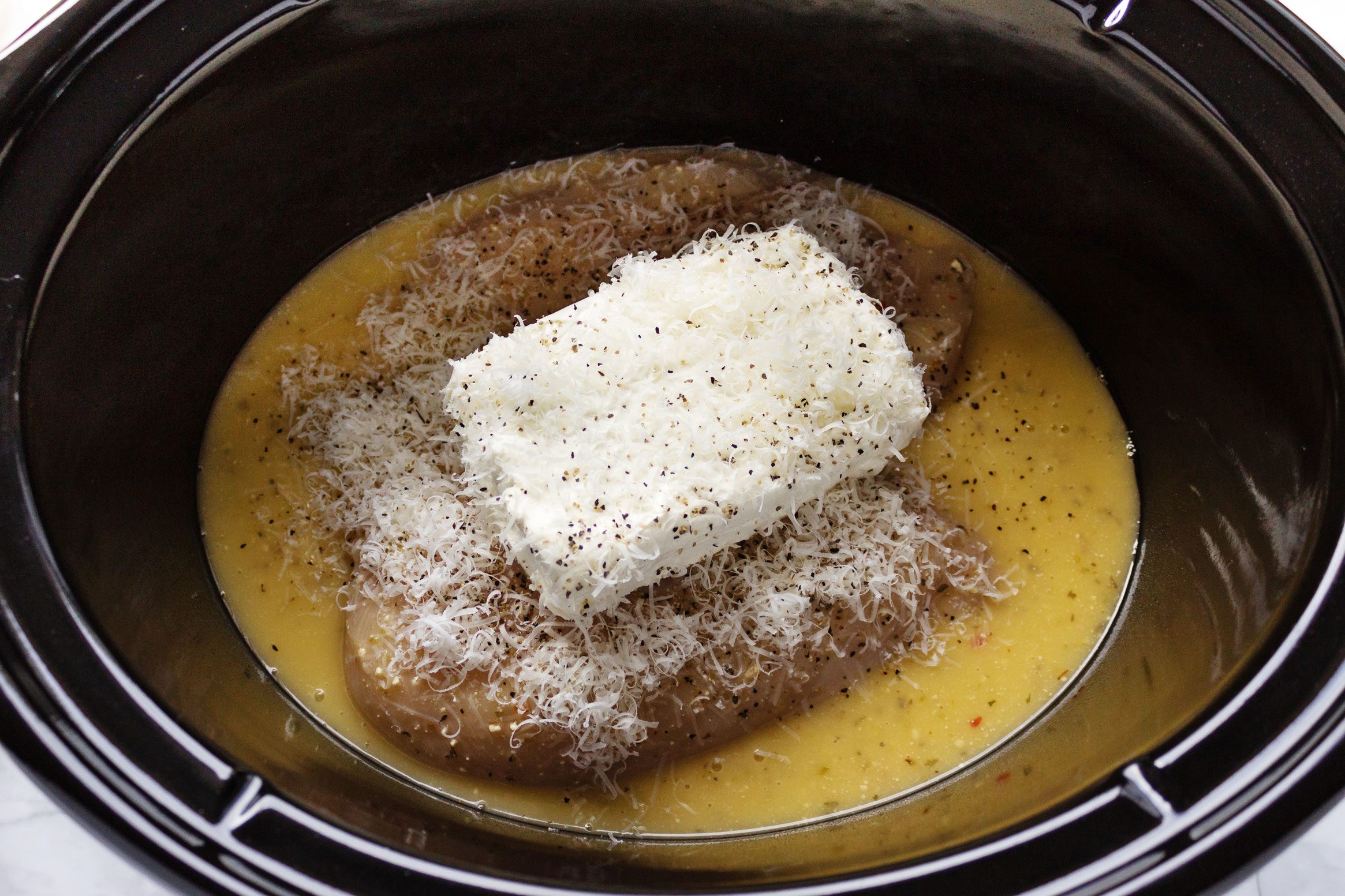 chicken and ingredients for Olive Garden Chicken Pasta