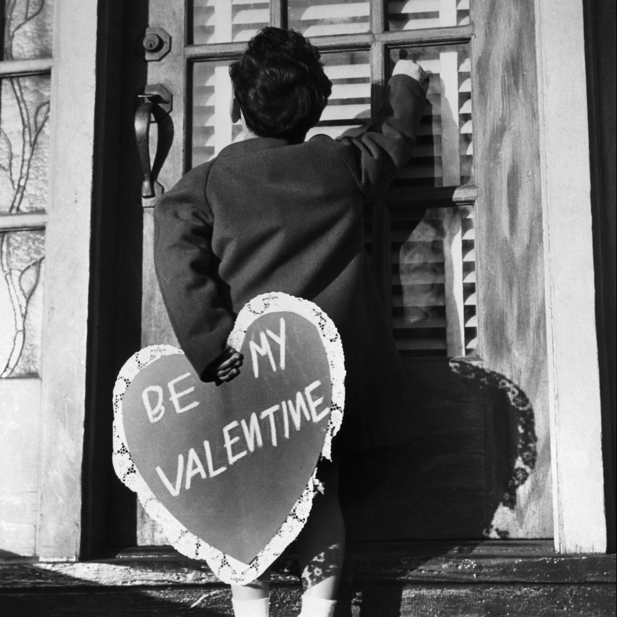 Little Boy Delivering A Valentine.With his heart in his hand, little Johnny McBride, 5, of the