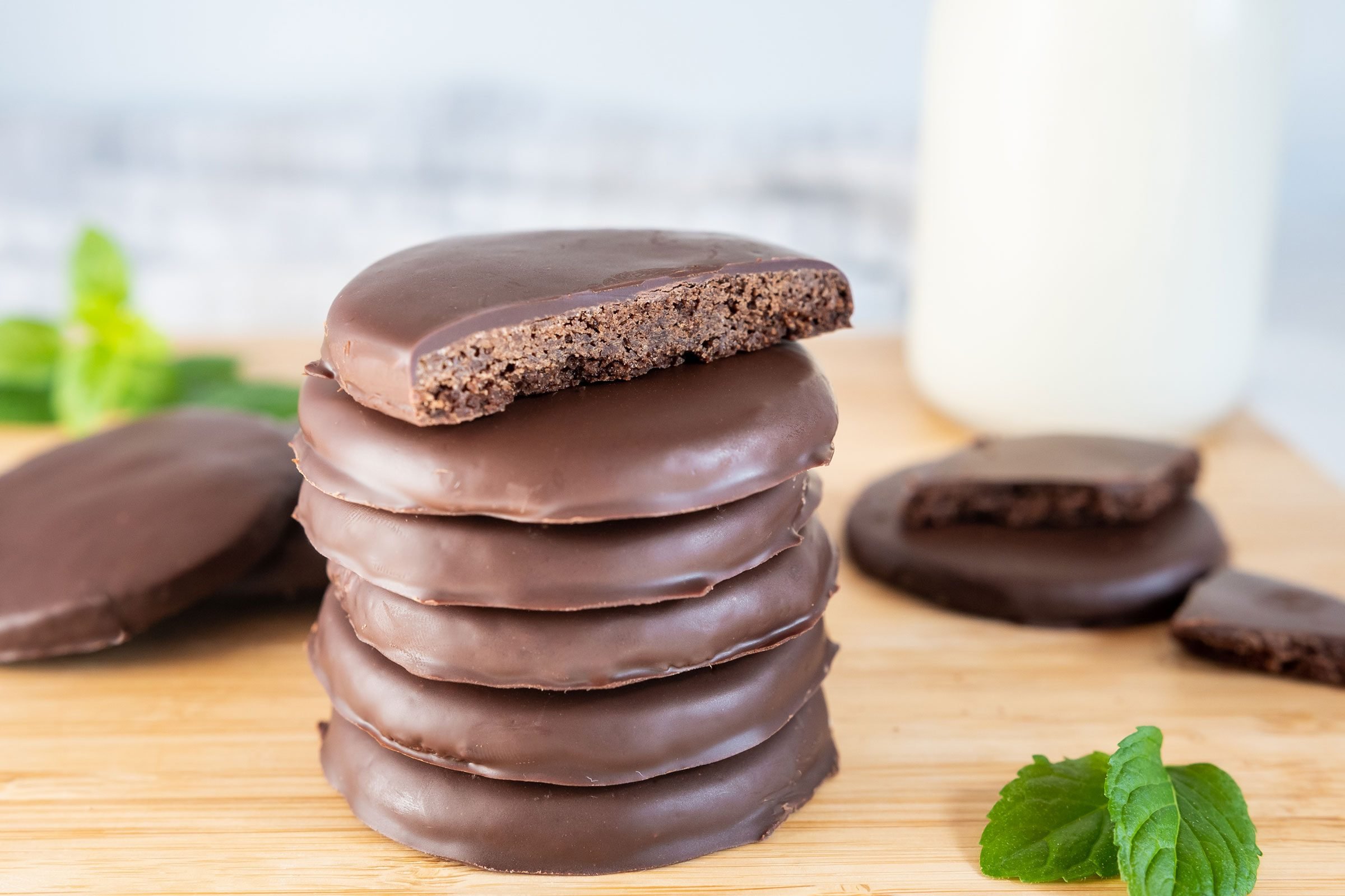 Homemade Thin Mints finished product with a bite taken out of one of the cookies